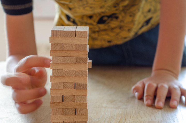 family playing board game